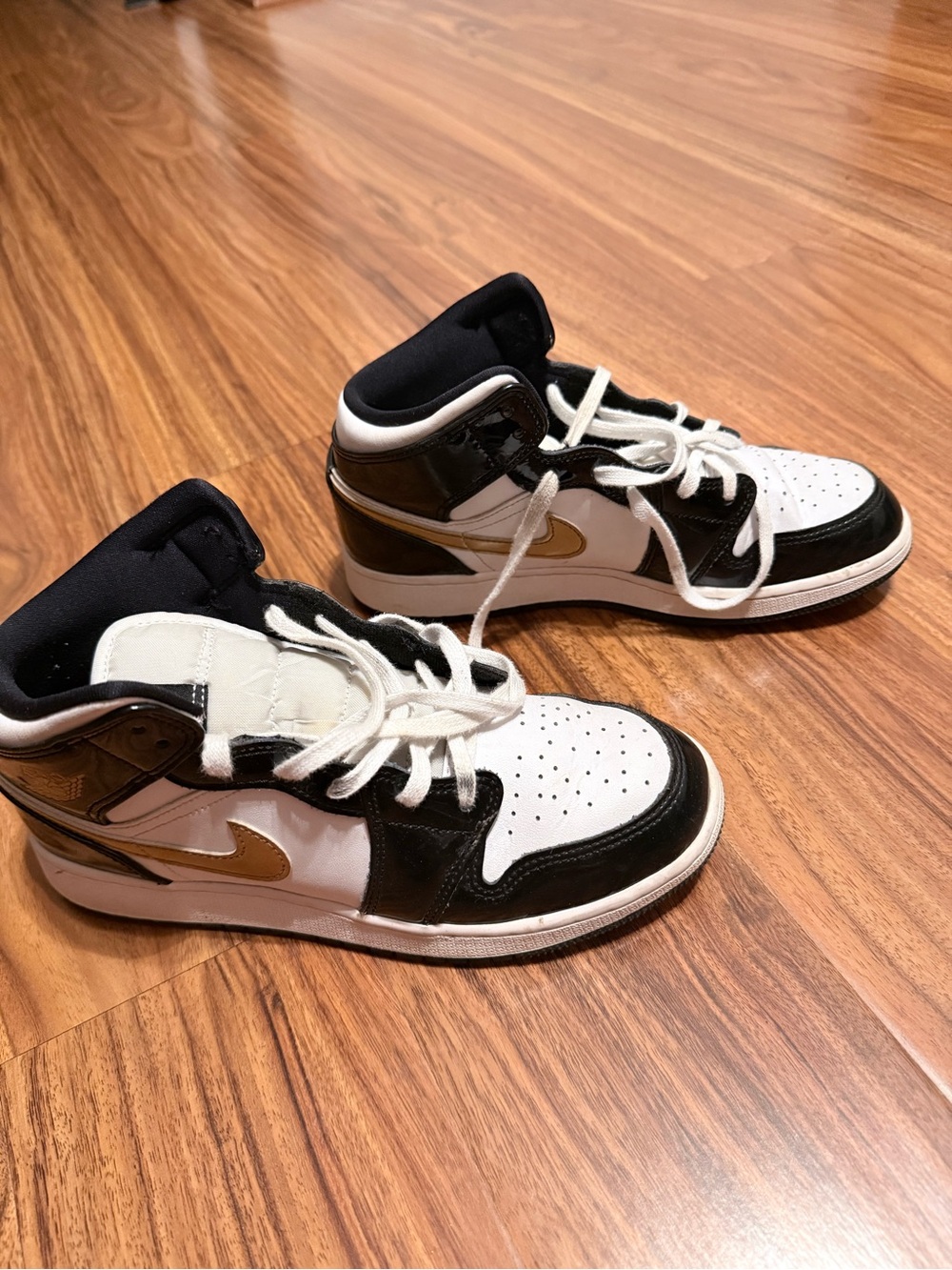 Nike youth Black, White & Gold Mid-Top Sneakers